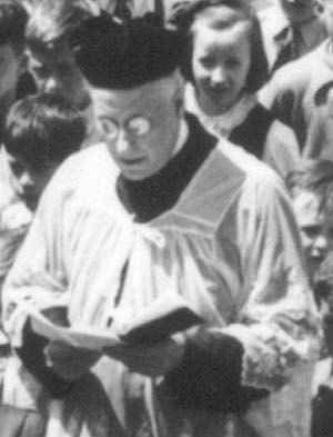 Rev.
 James E. Doyle